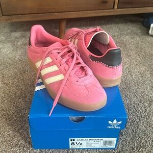 Adidas women's Gazelle pink (rose), green accent, and white.